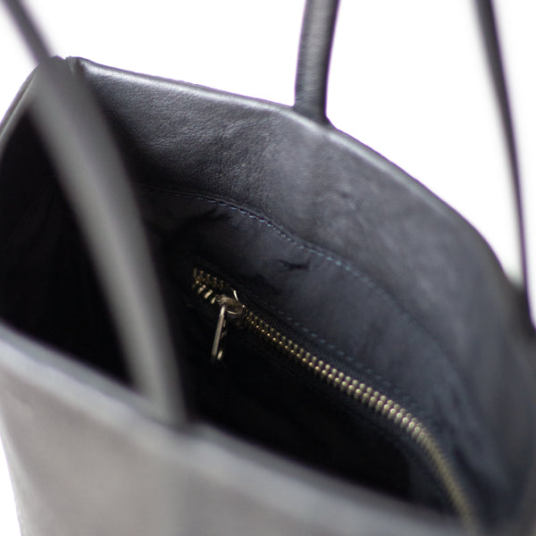 FLAT black leather bag